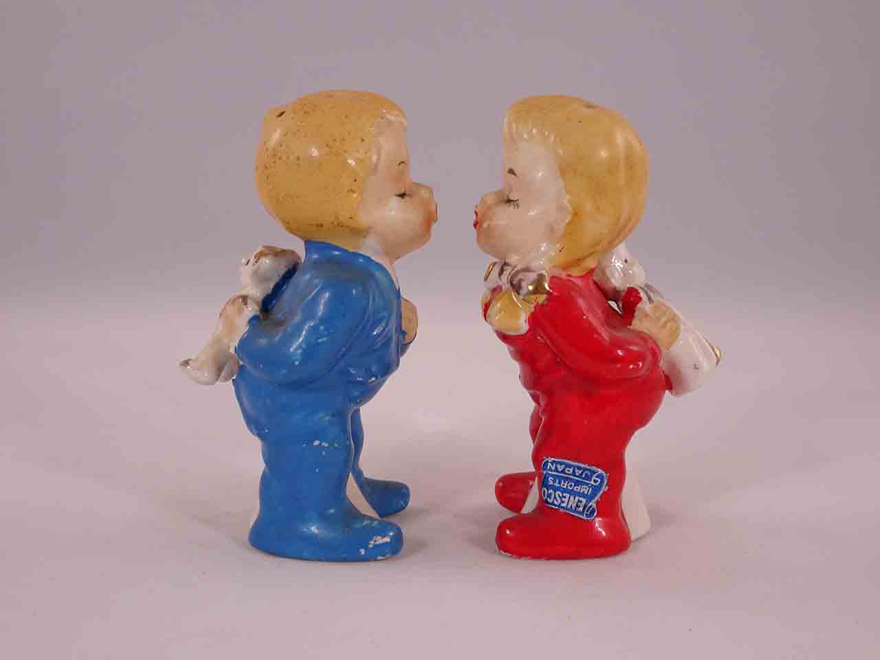 48374 Kissing American children holding objects behind their backs salt and pepper shakers