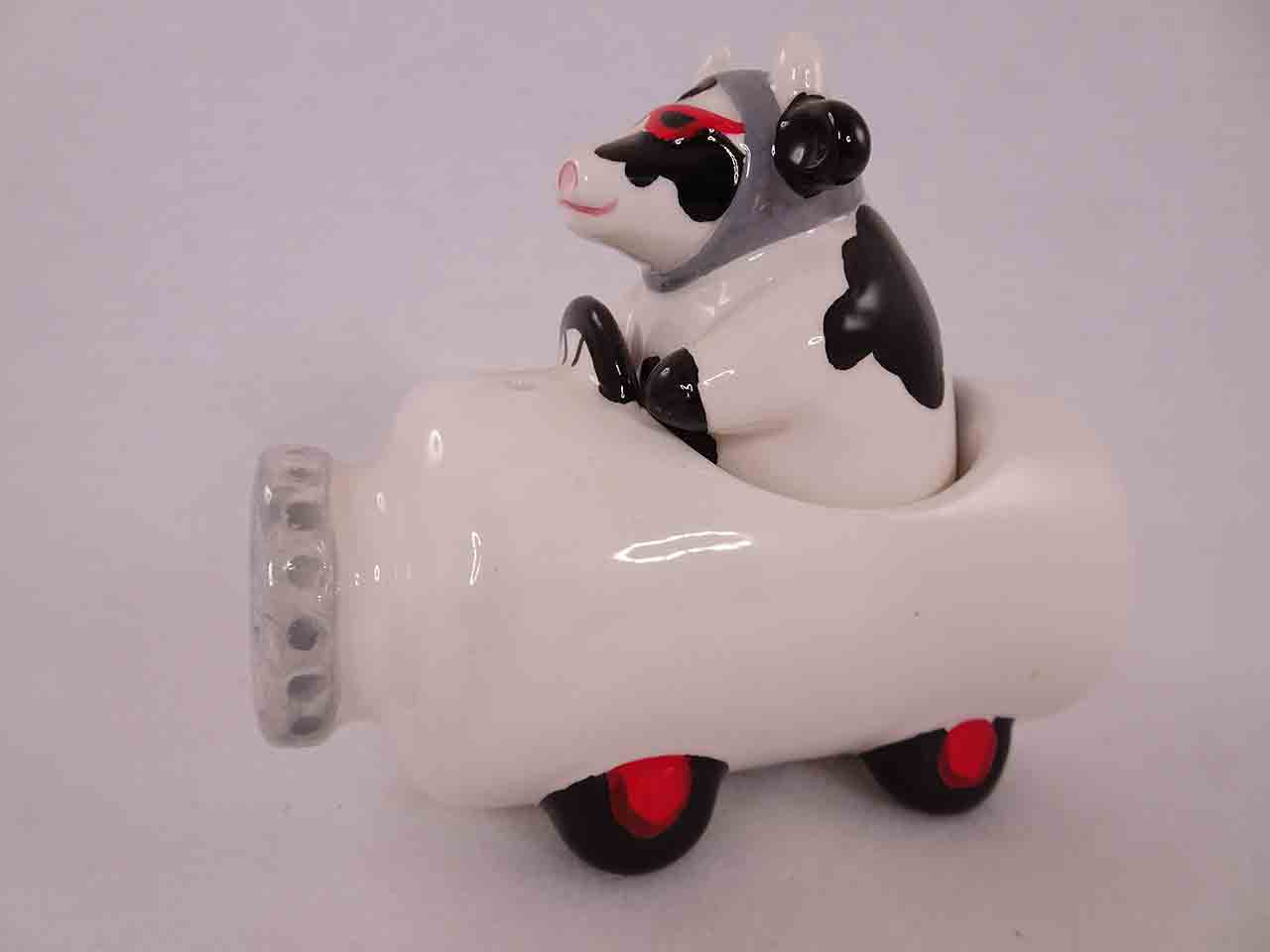50047 Clay Art salt and pepper shakers series of animals in funny race cars - cow in milk