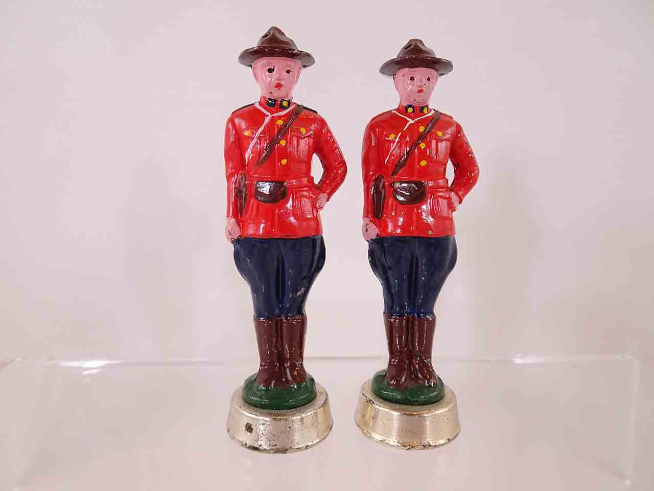 62640 Metal pair of Royal Canadian Mounted Police salt and pepper shakers