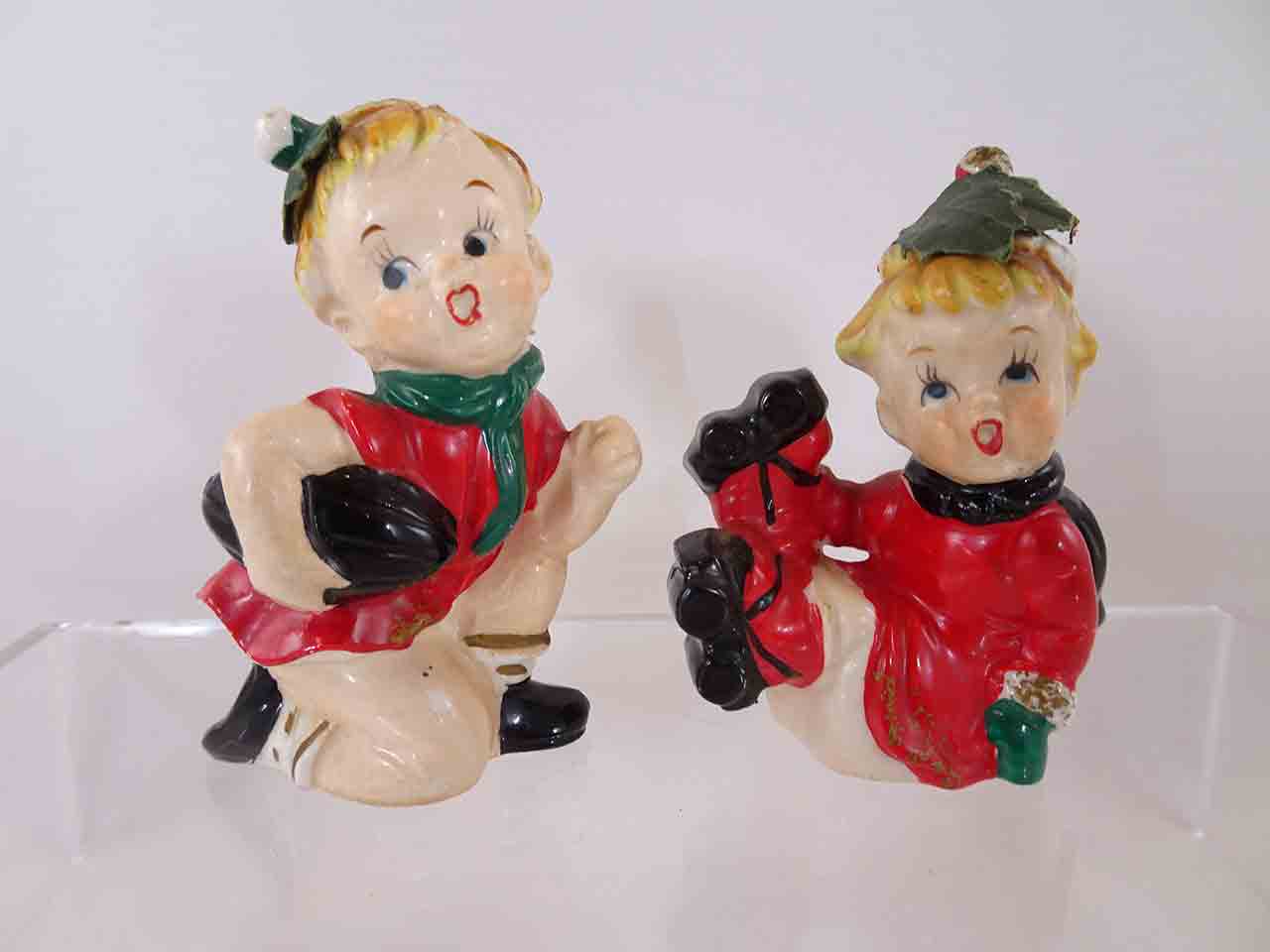 62789 Christmas children playing various sports series salt and pepper shakers