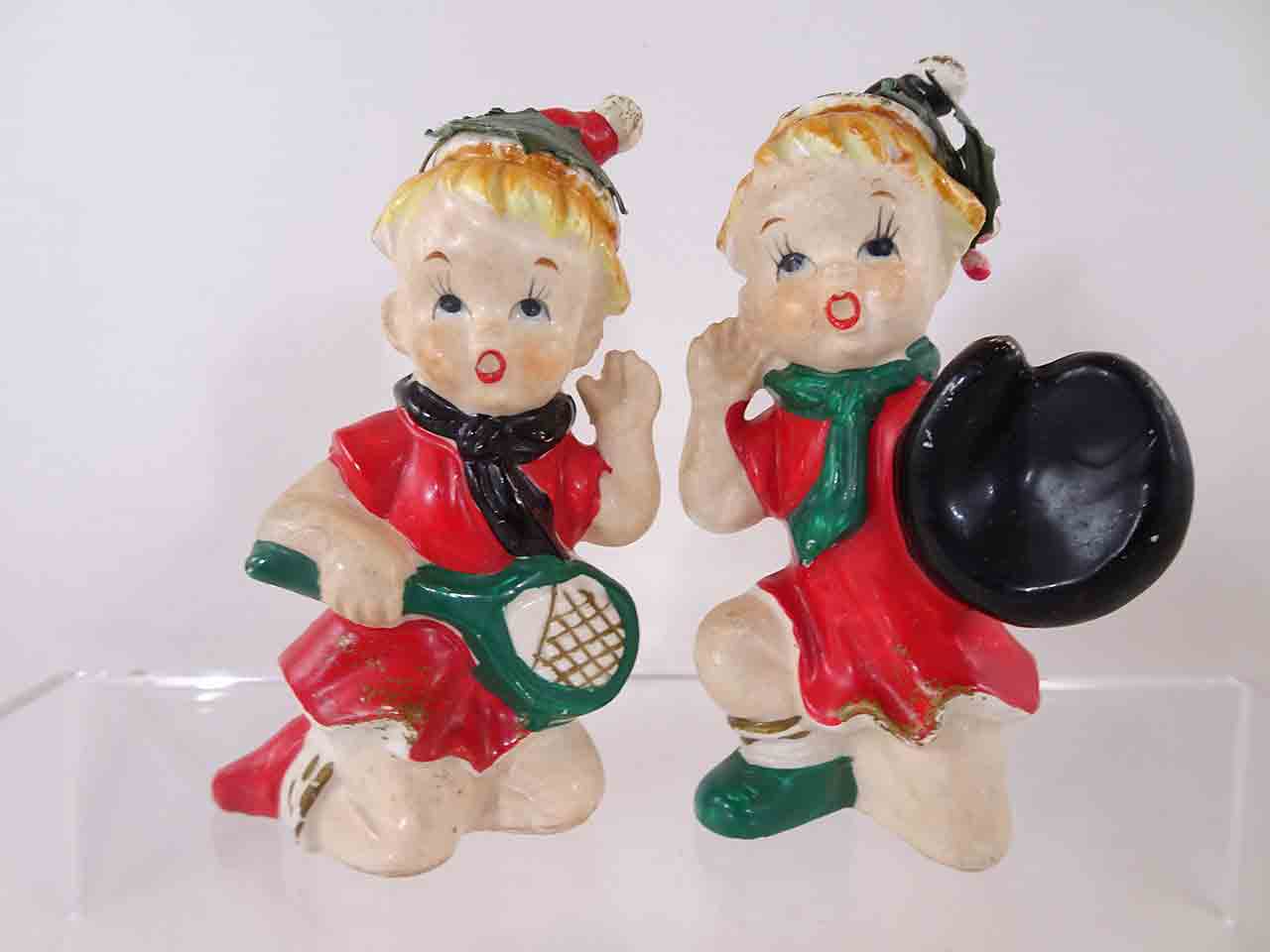 62790 Christmas children playing various sports series salt and pepper shakers