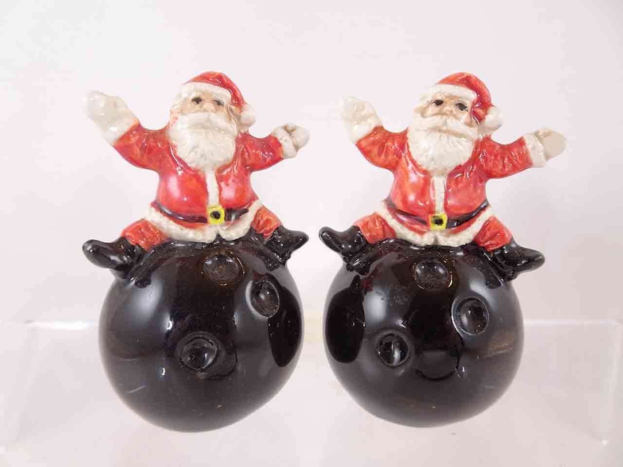63143 Christmas Santa Claus on bowling balls salt and pepper shakers by Linda Sexton