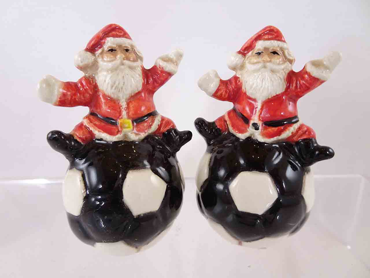 63145 Christmas Santa Claus on soccer balls salt and pepper shakers by Linda Sexton