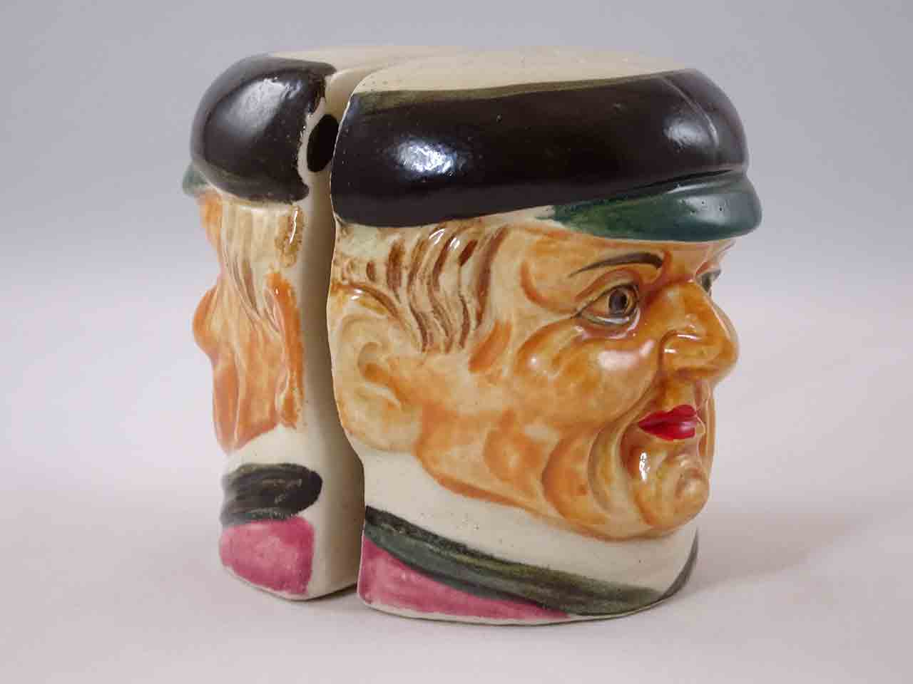 48272 Matching flat men heads salt and pepper shakers