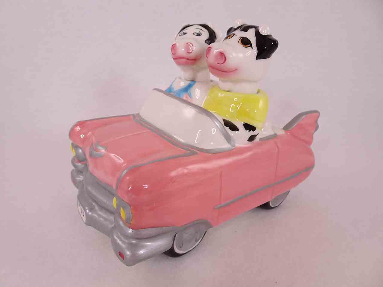 50052 Clay Art cows in car nodder salt and pepper shakers