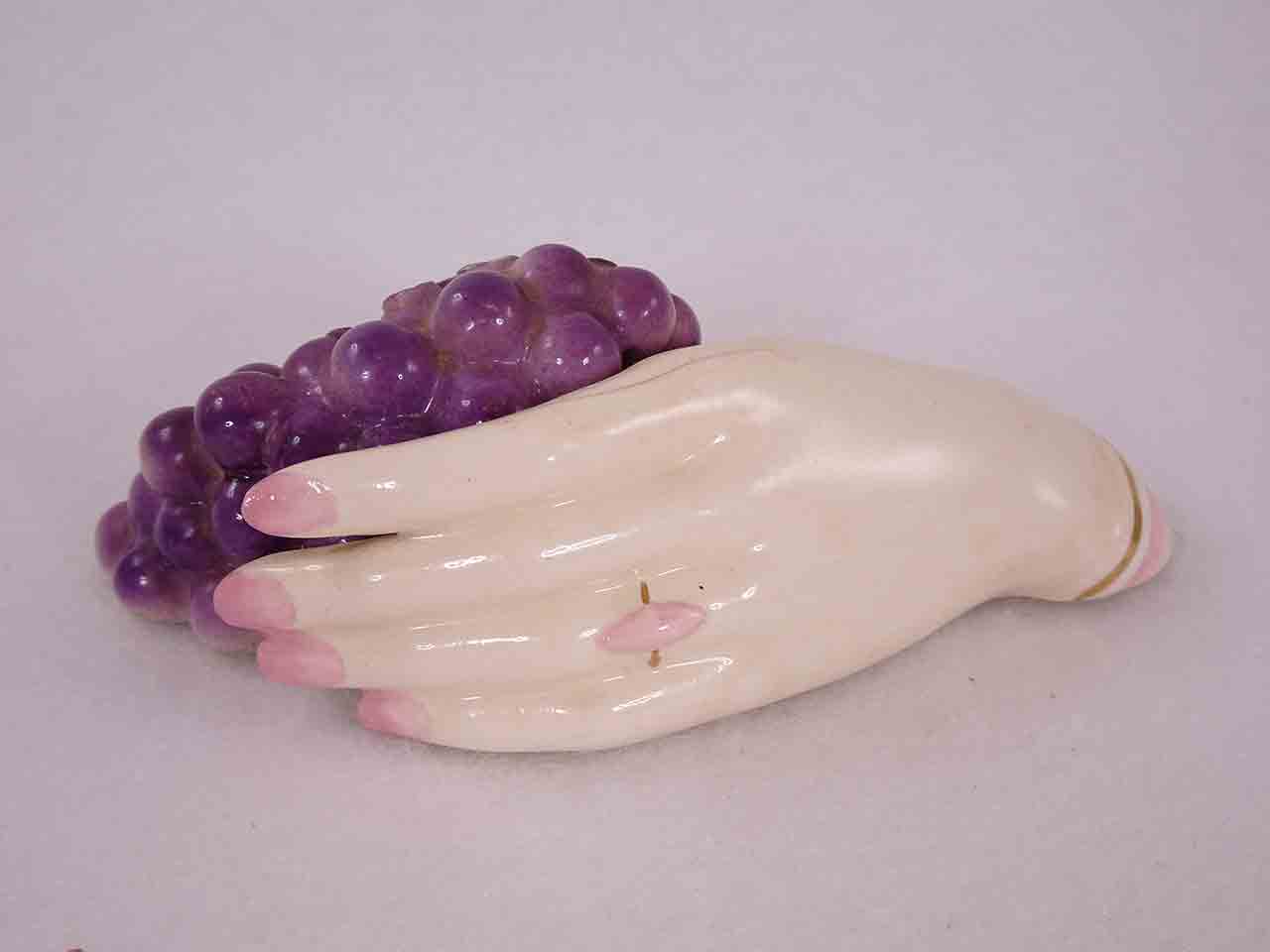 50515 Lady's hand holding clump of grapes salt and pepper shakers