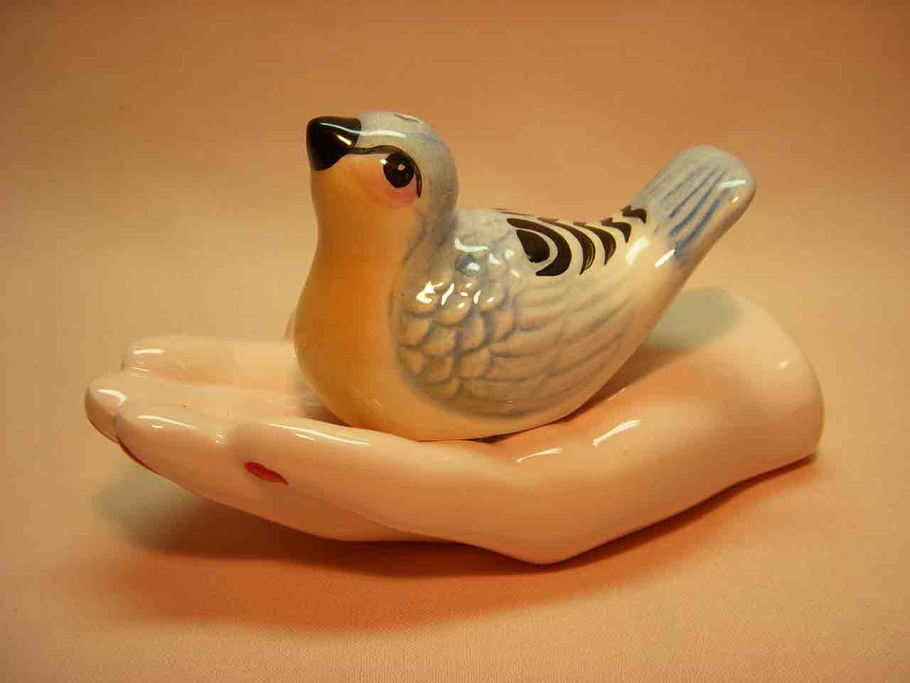 18999 Bird in hand salt and pepper shakers